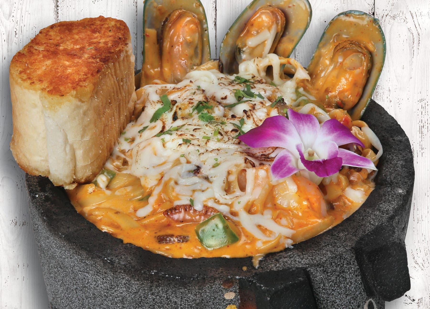 Molcajete Pasión with octopus, shrimp and Alfredo pasta at Villas Pueblita Mexican Restaurant in Indianapolis, IN
